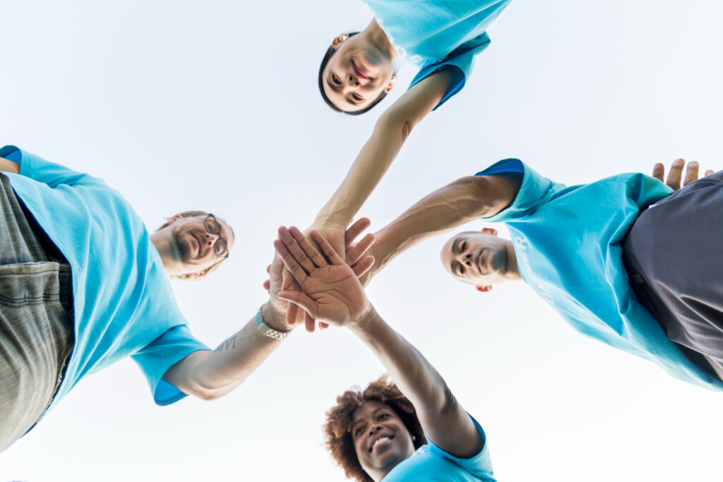 group-of-happy-and-diverse-volunteers group-of-happy-and-diverse-volunteers